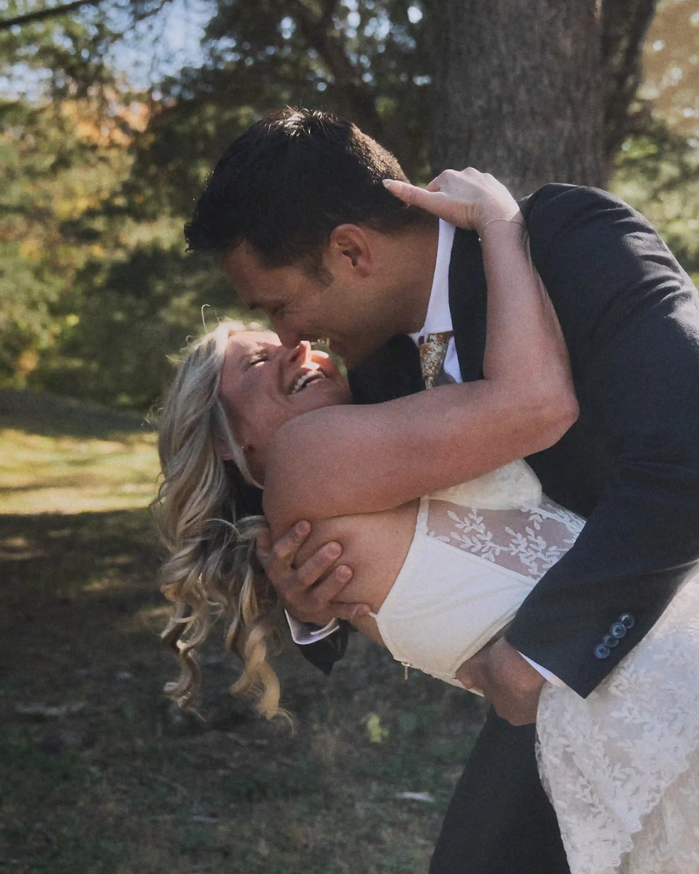 Picture of a wedding couple kissing each other